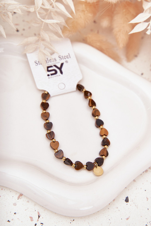 Um bracelete Corações Fabricado em aço cirúrgico Tem que serrrom