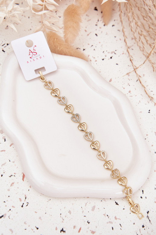 Um bracelete Fabricado em aço cirúrgico com olhos brilhantes cor dourada