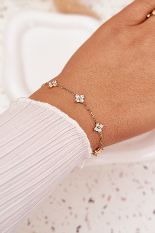 Um braceletecom motivos floraisuszkami Stal Chirurgiczna cor dourada