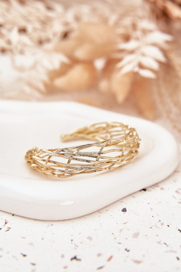 Um bracelete Legal Fabricado em aço cirúrgico cor dourada 2