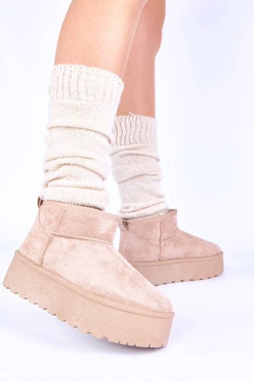 Botas de neve cor bege em plataforma...