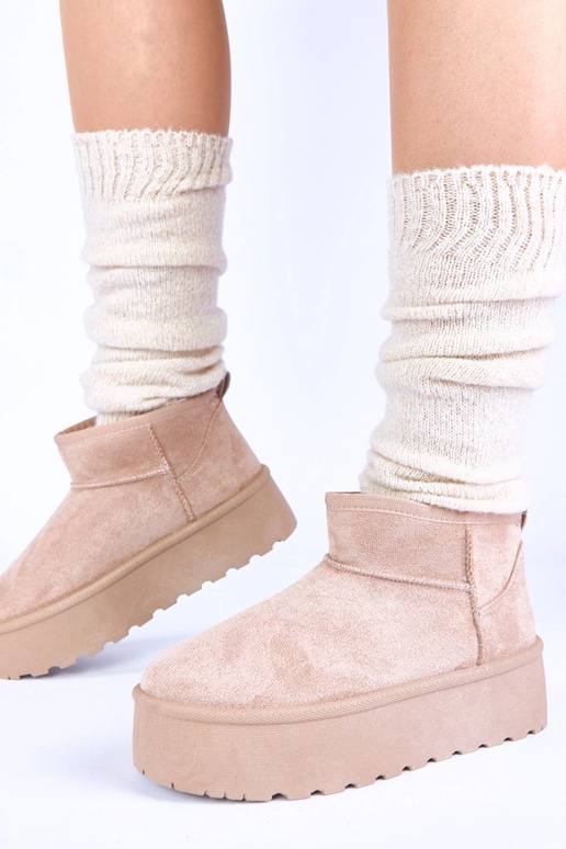 Botas de neve cor bege em plataforma...