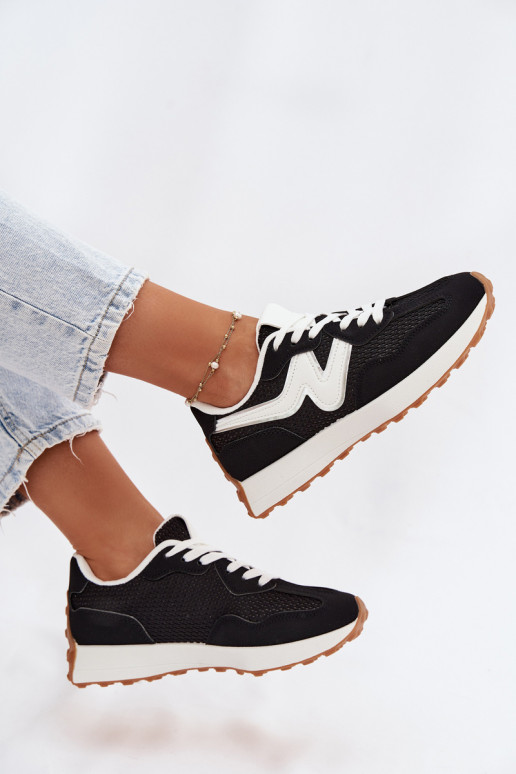 tênis Feminino com uma plataforma cor preta Janelora