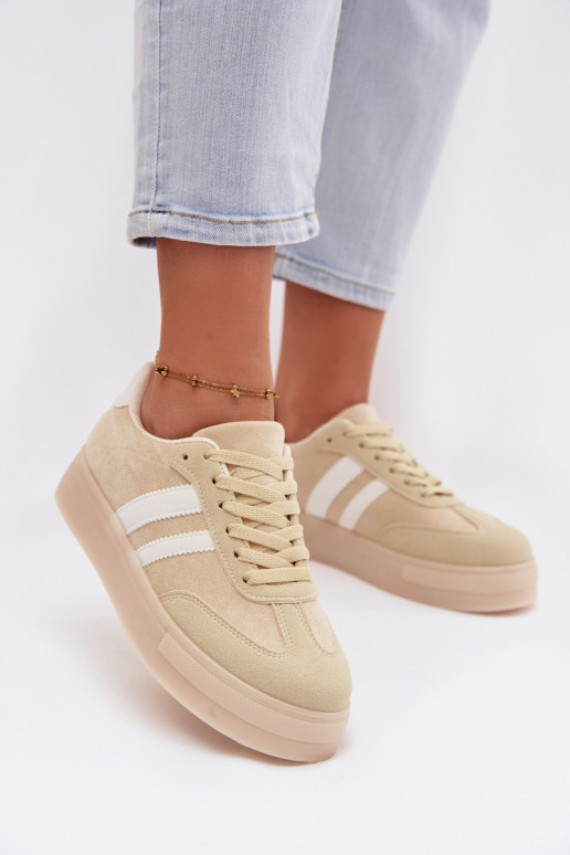 À modalo de tênis Feminino com uma plataforma cor amarela Giselia