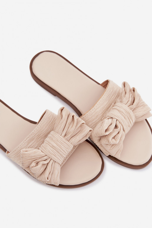 Chinelos femininos com saltos largos e laços em tom areia Amivelle