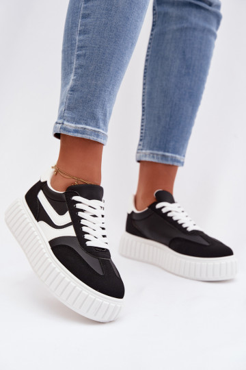 À modalo de tênis Feminino com uma plataformade camurça ecológicau cor preta Cadrina 2