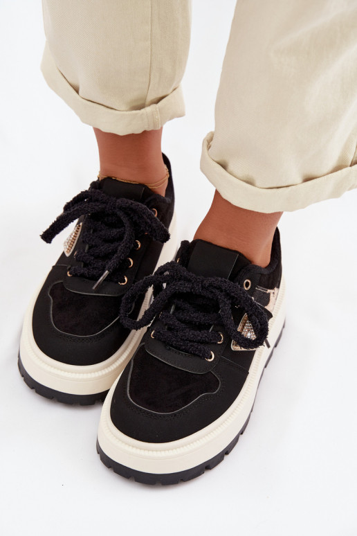 À modalo de tênis Feminino com uma plataforma cor preta Florinda