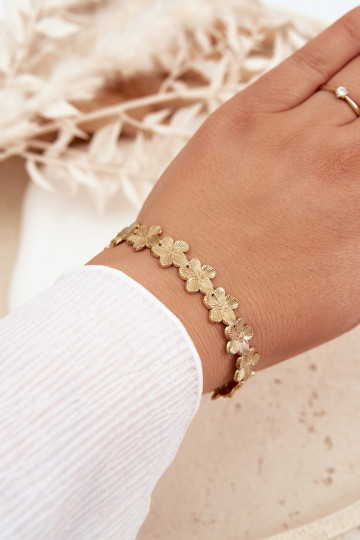 Pulseira feminina de aço inoxidável com motivos florais na cor dourada