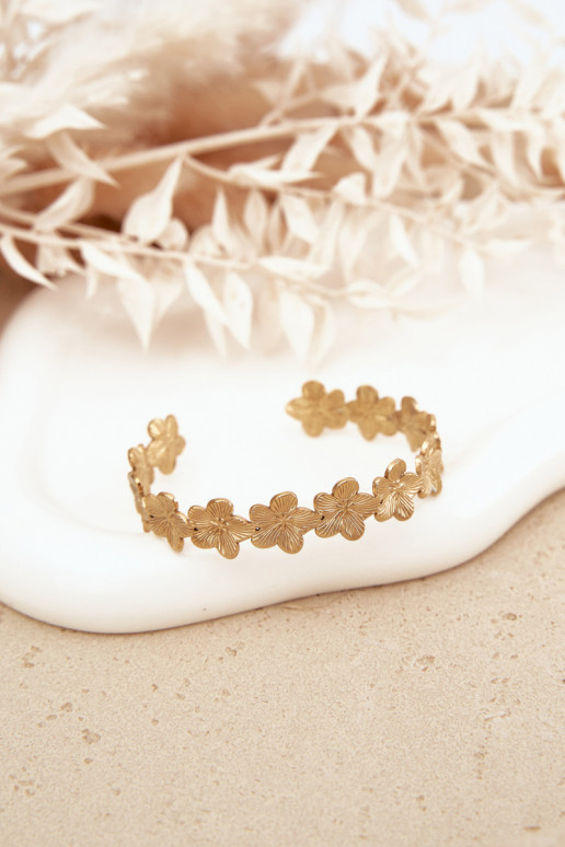 Um bracelete Feminino de aço inoxidável com motivos floraisuszki cor dourada