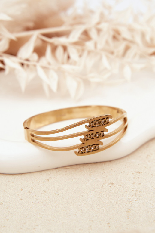 Feminino Um bracelete de aço inoxidável cor dourada