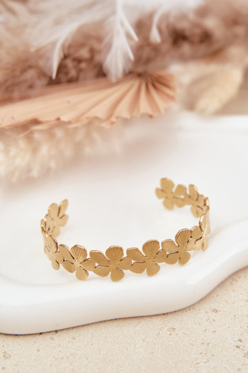 Um bracelete Feminino de aço inoxidável com flores cor dourada 2