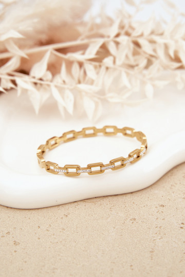 Um bracelete Feminino Decorado com zircônias cúbicas cor dourada 2