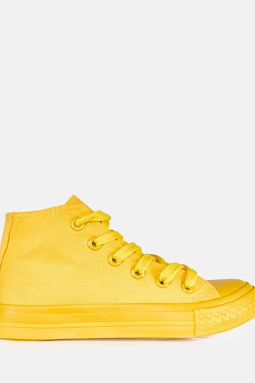 Tênis amarelos infantis acima do...