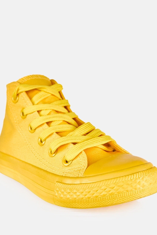 Tênis amarelos infantis acima do...