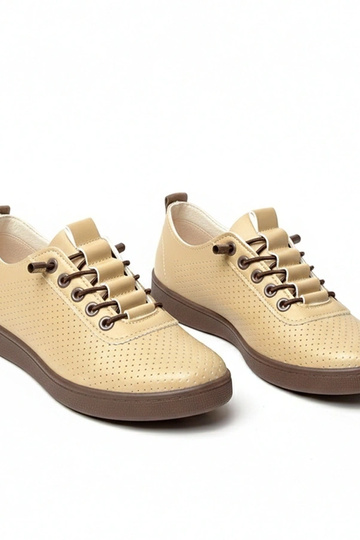 Tênis em tom areia com... 2