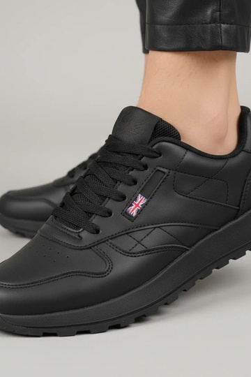 Tênis casuais pretos com...