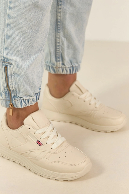 Tênis casuais em tom areia claro com...