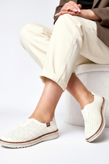 Meias botas brancas com... 2