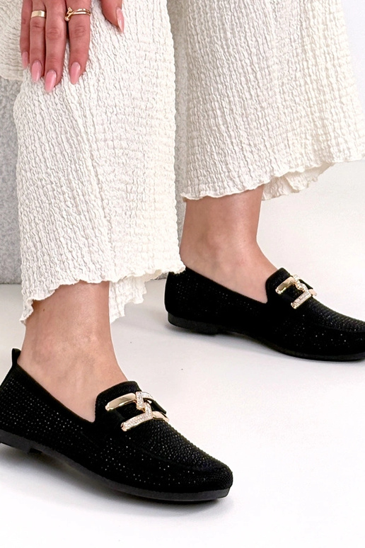 Mocassins pretos decorados com...