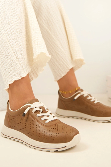 Tênis esportivos arejados e...