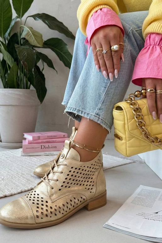 Botins perfurados dourados Potocki