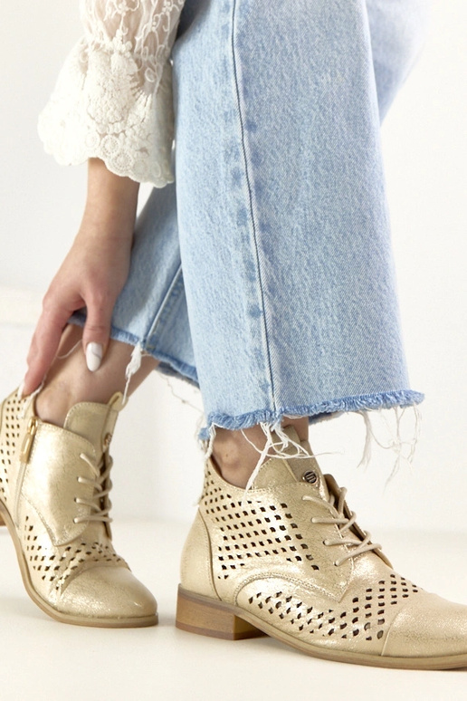 Botins perfurados dourados Potocki