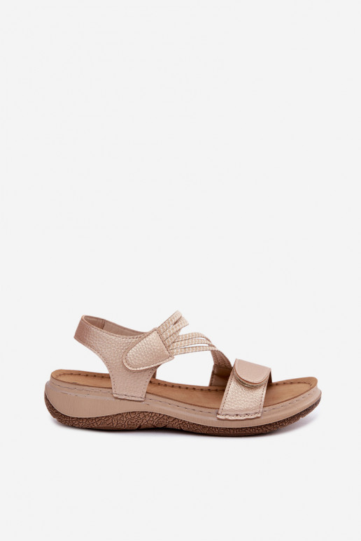 Sandálias douradas femininas com tiras elásticas