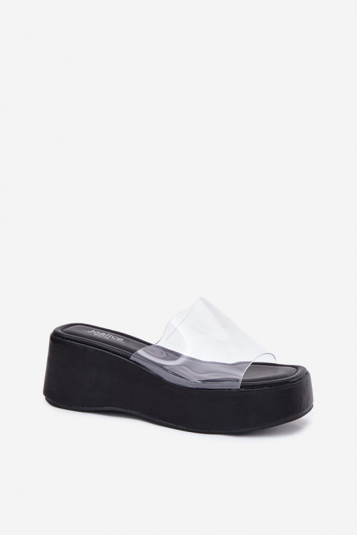 Chinelos femininos pretos com tiras transparentes na plataforma Meltiana