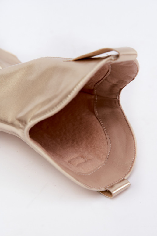 botas altas de estilo cowboy com salto na cor dourada