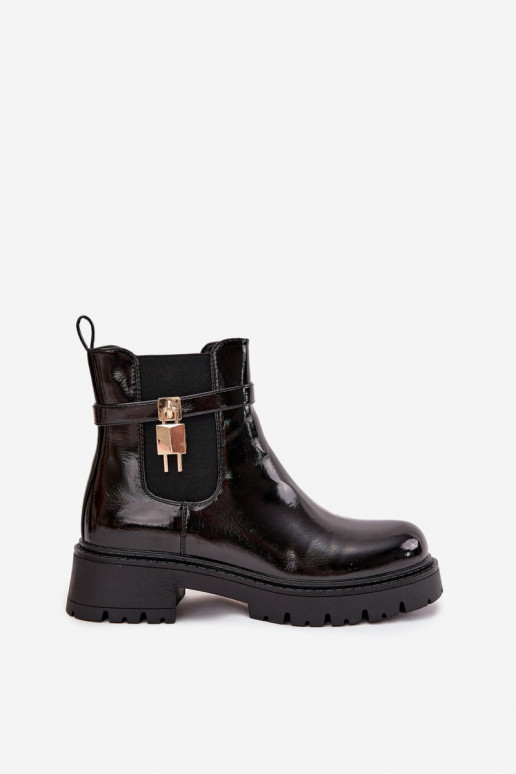 Botins isolados e elegantes com detalhes Ze dourados e pretos Talyra