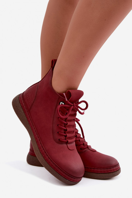 Botins isolados em couro sintético Artiker na cor bordô