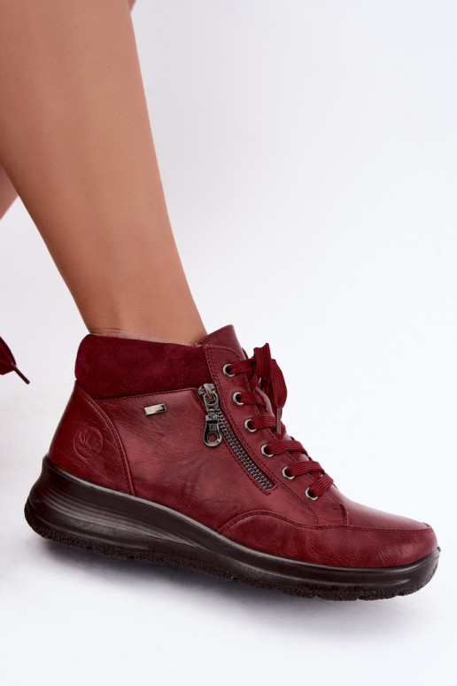 Botins femininos isolados com pelo por dentro na cor bordô Parvella