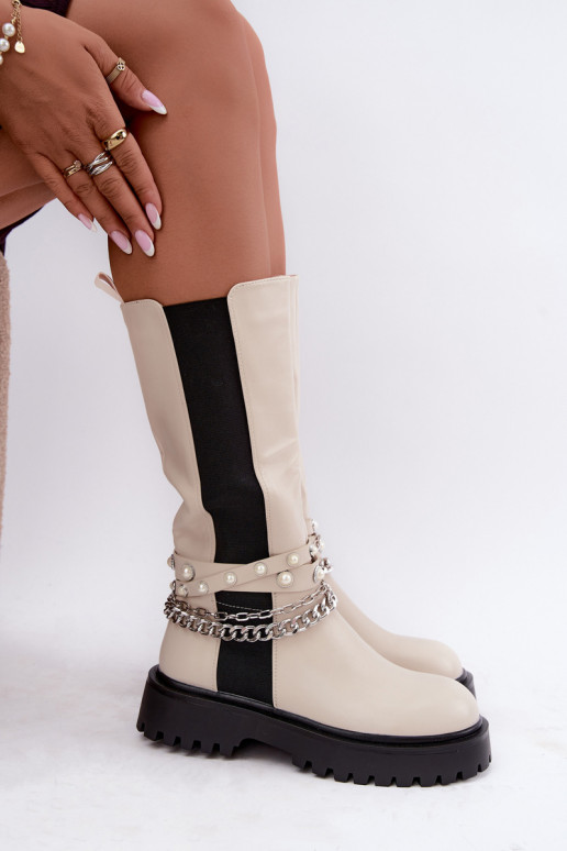 botas altas forradas com plataforma e correntes na cor areia Doremi