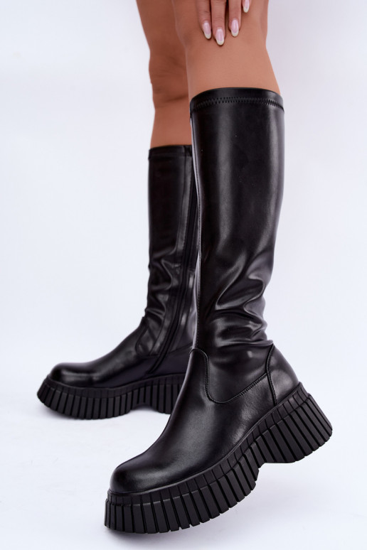 Botas pretas até o joelho com plataforma Haldora