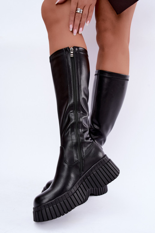 Botas pretas até o joelho com plataforma Haldora