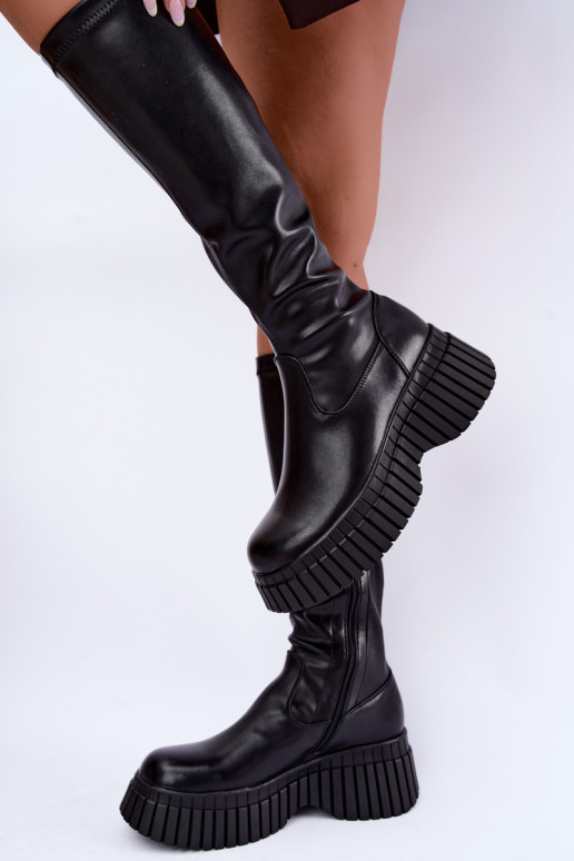 Botas pretas até o joelho com plataforma Haldora