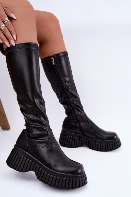 Botas pretas até o joelho com plataforma Haldora