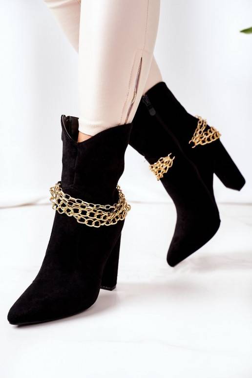 Botas aquecidas com salto preto Good... Botas aquecidas com salto preto Good...