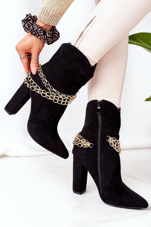 Botas aquecidas com salto preto Good... Botas aquecidas com salto preto Good...