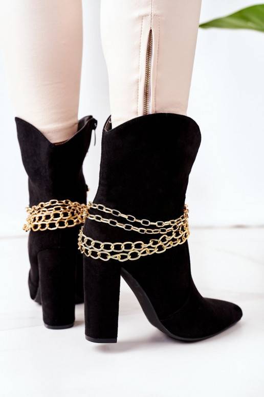 Botas aquecidas com salto preto Good... Botas aquecidas com salto preto Good...