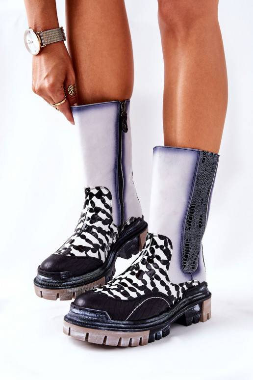 Botas elegantes pretas e brancas