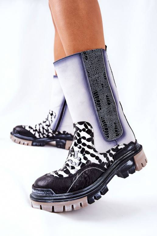 Botas elegantes pretas e brancas