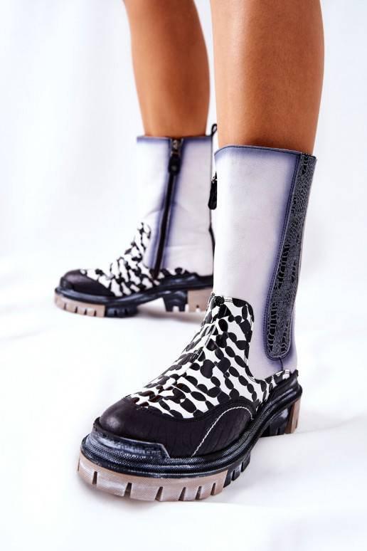 Botas elegantes pretas e brancas