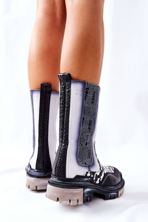 Botas elegantes pretas e brancas