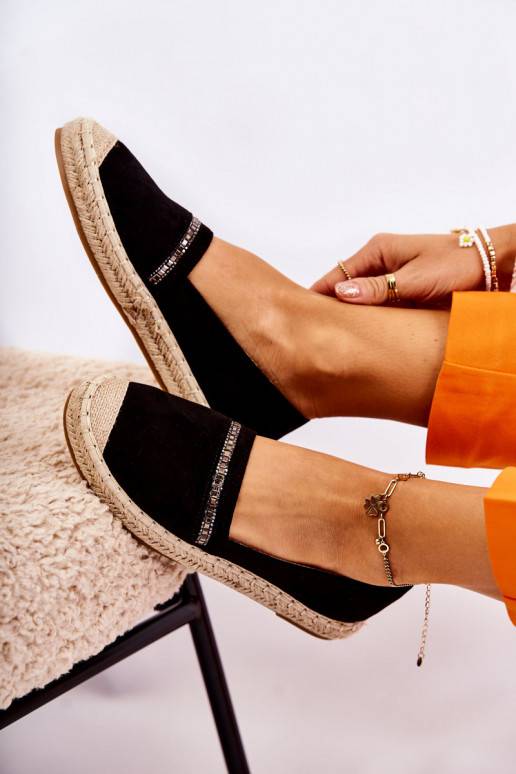 Alpercatas Cersei pretas de um modelo...