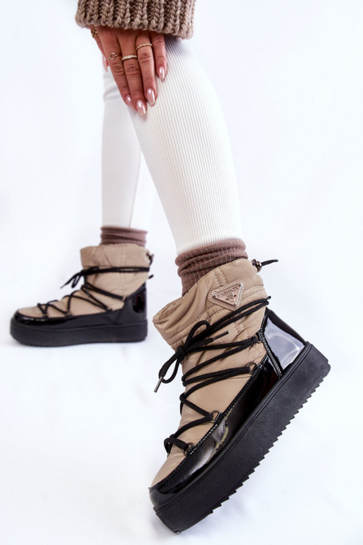 Botas de neve pretas areia com... Botas de neve pretas areia com...