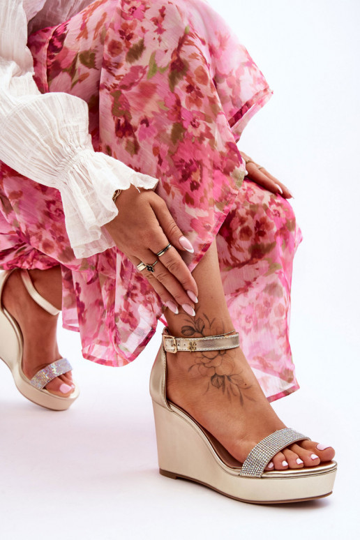 Sandálias douradas Arwen com plataforma