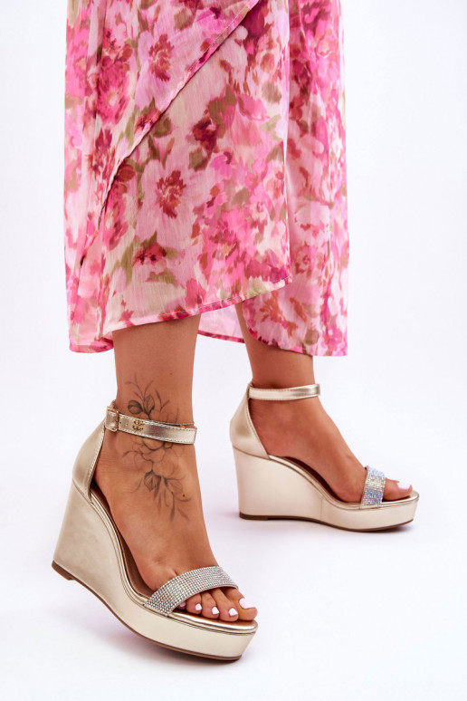 Sandálias douradas Arwen com plataforma