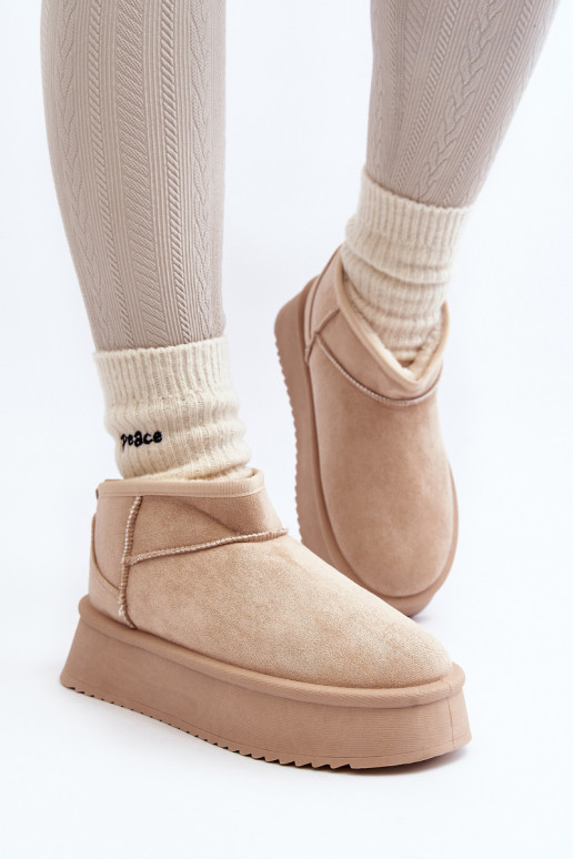 Botas de neve com sola maciça bege...