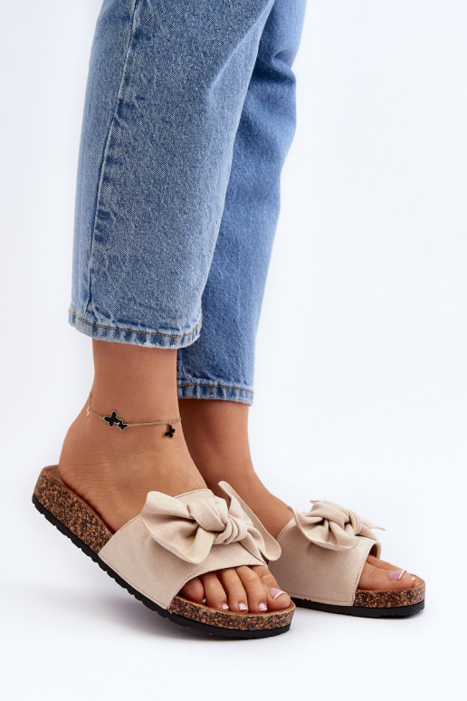 Chinelos femininos com fita bege... Chinelos femininos com fita bege...